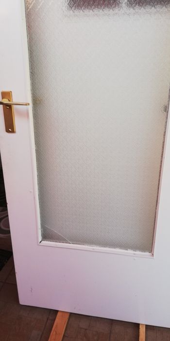 Skrzydła drzwiowe białe z klamkami,różne