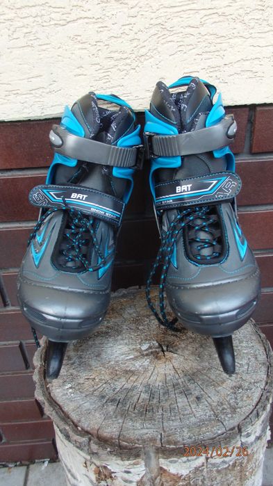 Buty zimowe z łyżwami regulowane od 34 do 37.