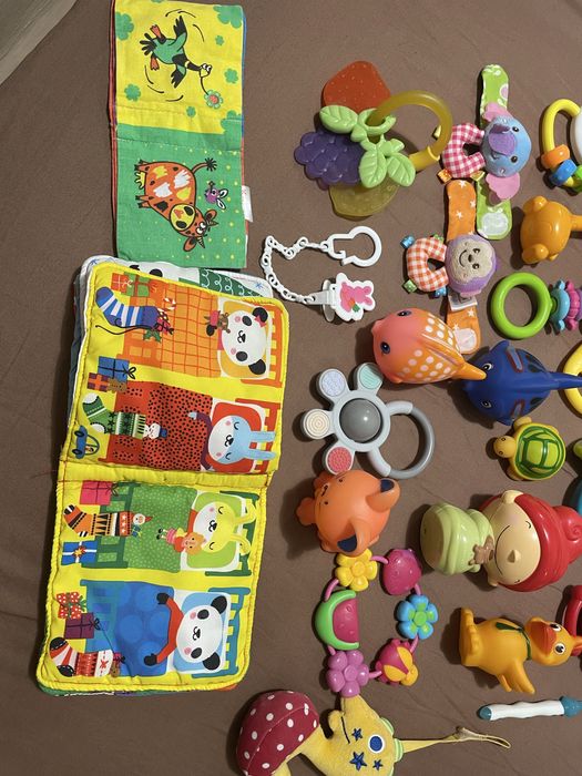 Іграшки для новонароджених. Гризунці. Брязкальця. Кліпса для соски.