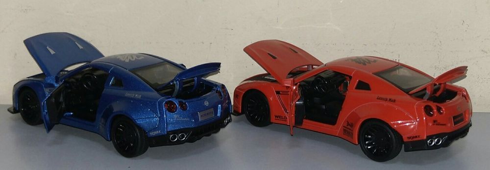 Машинка Nissan GTR модель 1:32 Автопром. Металл