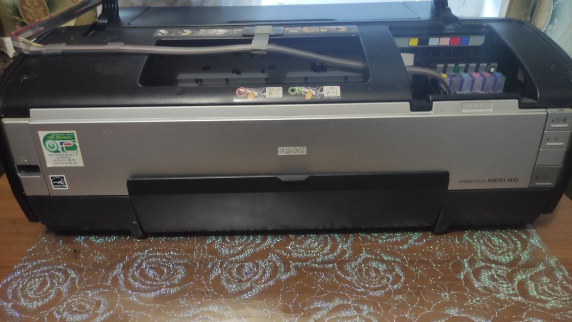 Epson Stylus Photo 1410 Требует сервисного обслуживания