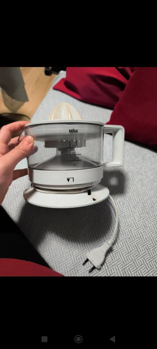 Elektryczna wyciskarka do cytrusów wolnoobrotowa do soków Braun biała