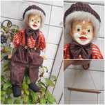 Duża lalka porcelanowa klown/ pajac/ arlekin na huśtawce
