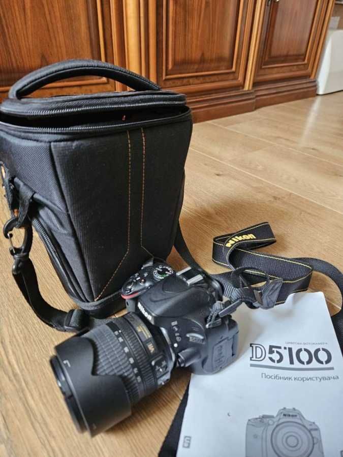 Продам як нову фотокамеру Nikon D5100 з класним об'єктивом.