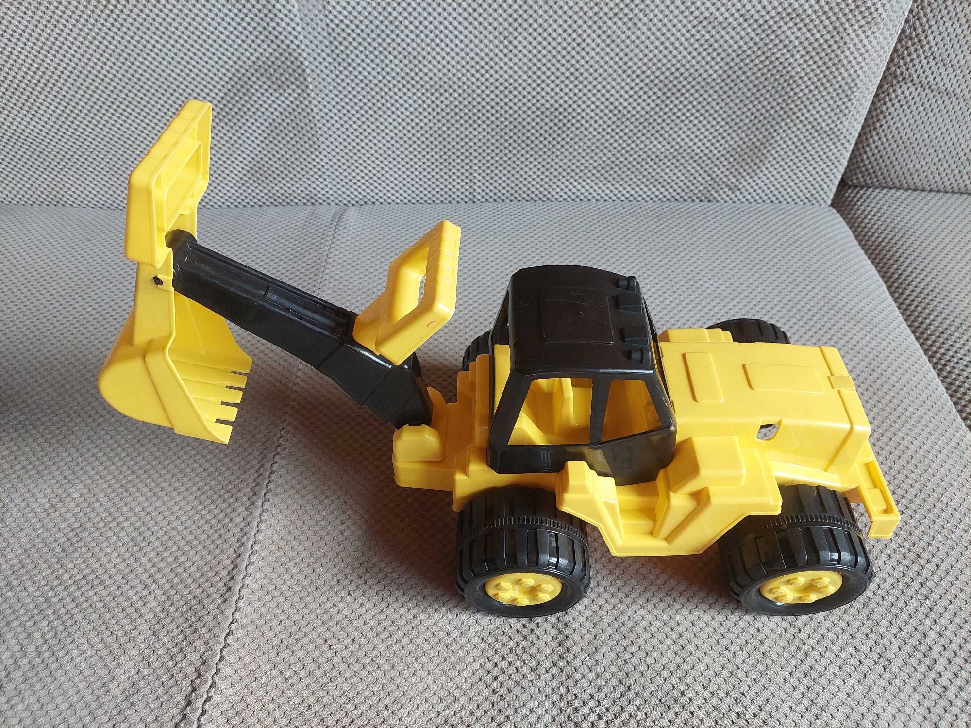 nowy traktor - koparka