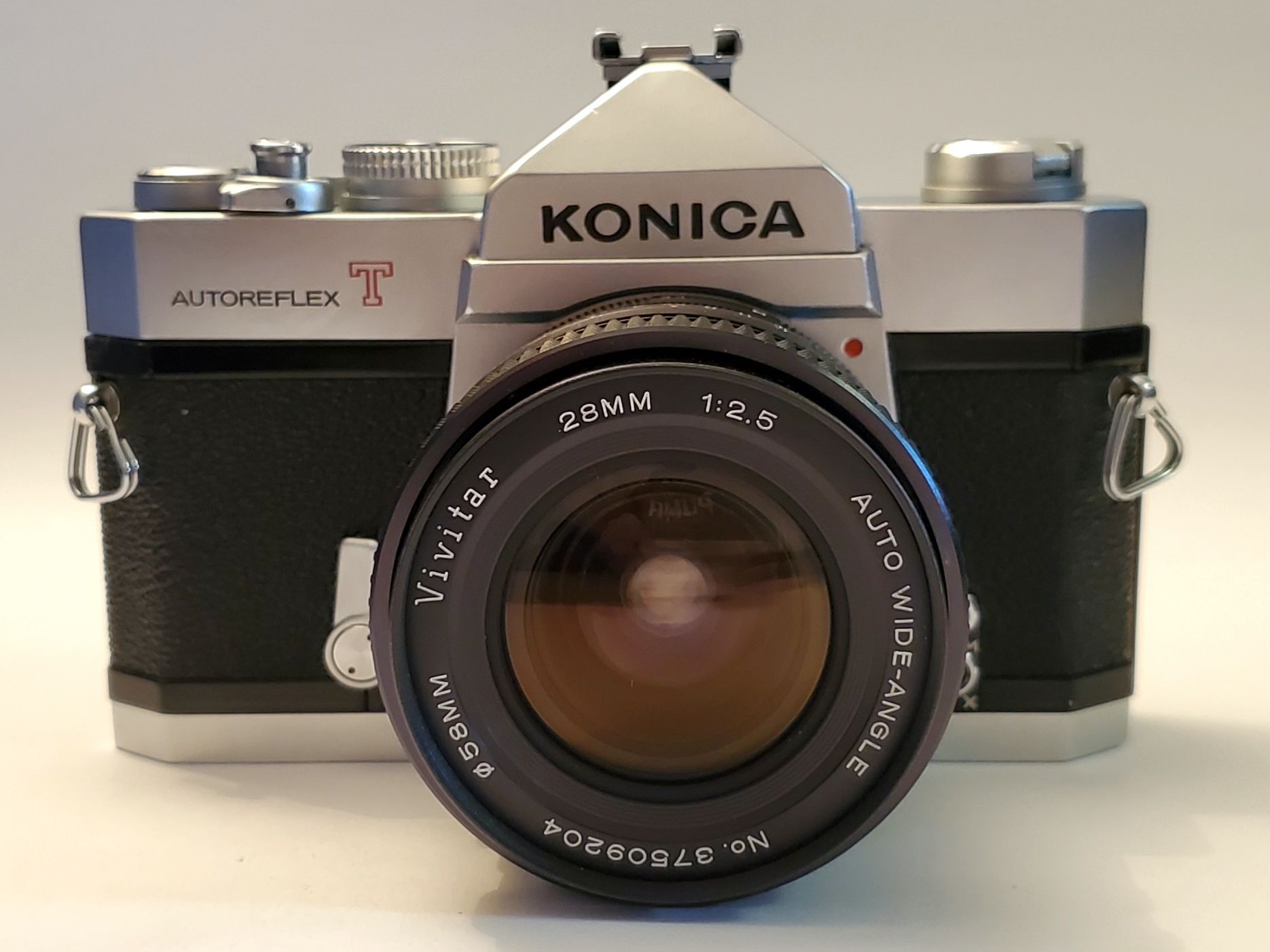 Пленочный фотоаппарат зеркальный Konica Autoreflex T2 + 2 объектива