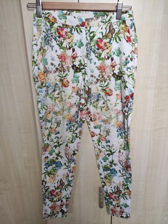 Spodnie damskie z materiału w kwiaty XS (34) wiskoza Reserved