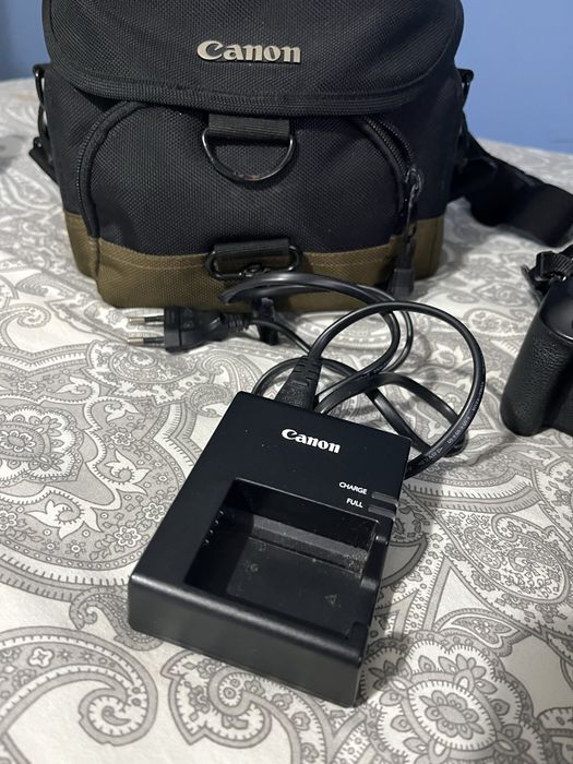 Canon 1200D + 2 objetivas + cartao memória + carregador + bolsa