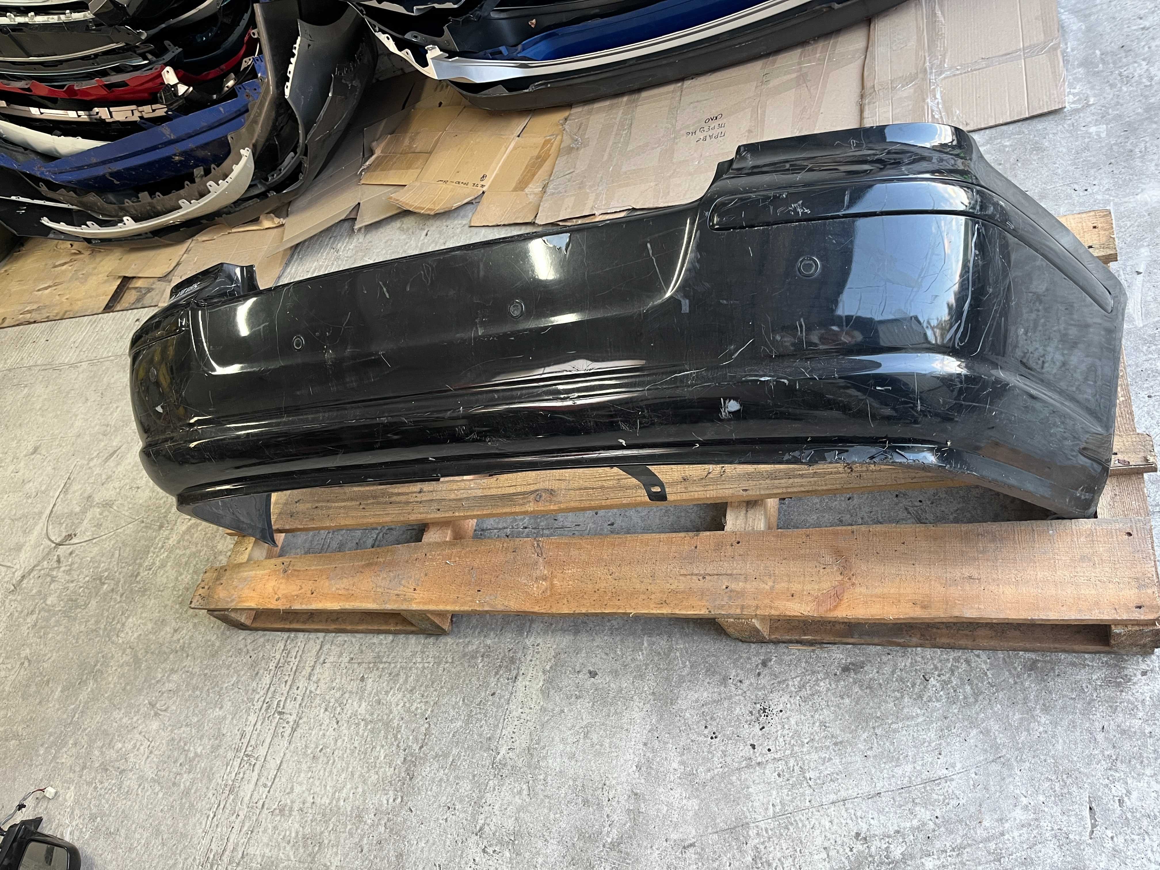 Задній бампер Toyota Avensis T25 седан 2003-2008 5215905090