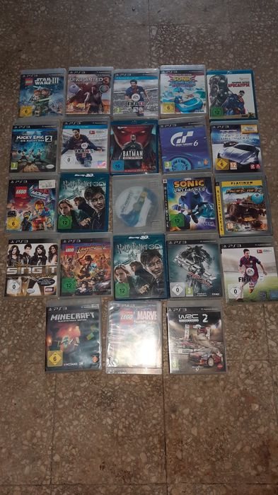 PS 3 com comando, volante, pedais e 22 jogos