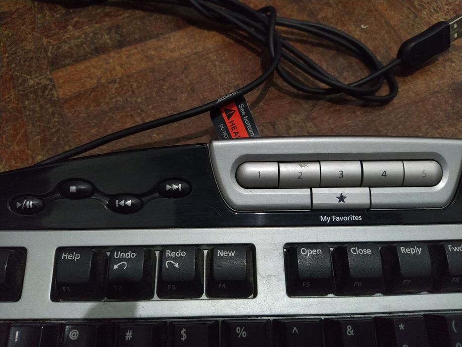 Teclado Microsoft com leitor biométrico layout US