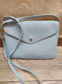 Жіноча сумка-клач голубий