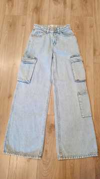 Женские джинсы карго палаццо с карманами.