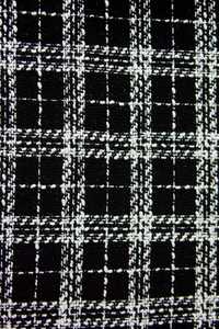 Czarna tkanina tweedowa w białą kratkę