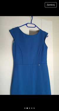 Elegancka niebieska sukienka