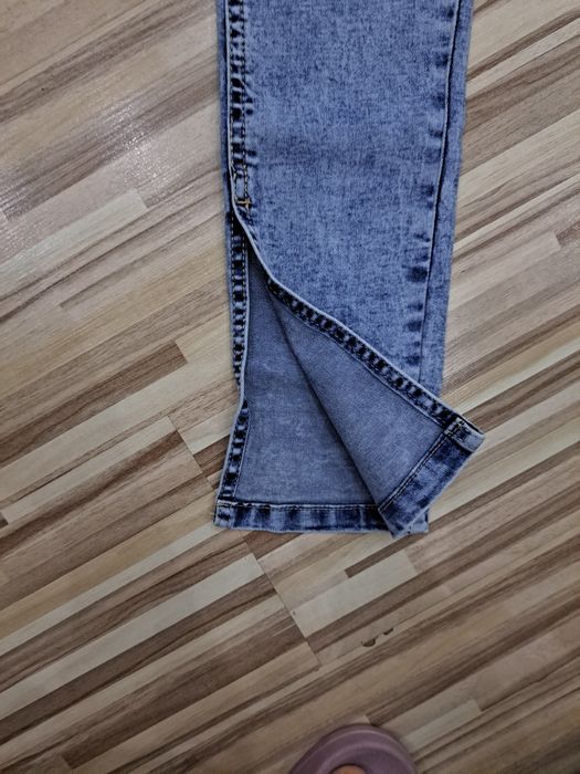 Jeansy sinsay skinny wysoki stan 32 rozcięcia na nogawkach