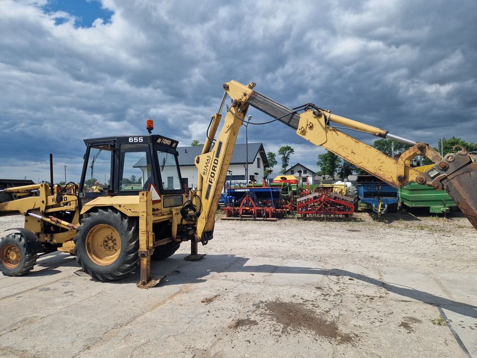 Koparko-ładowarka Ford 655 koparka New Holland NH 95 4x4