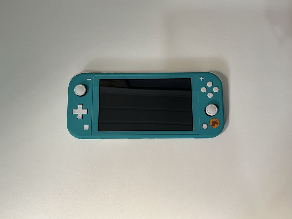 Nintendo Switch Lite Turquesa + Extras