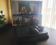 PS4 Slim de 1Tb com 2 comandos e 5 jogos.
