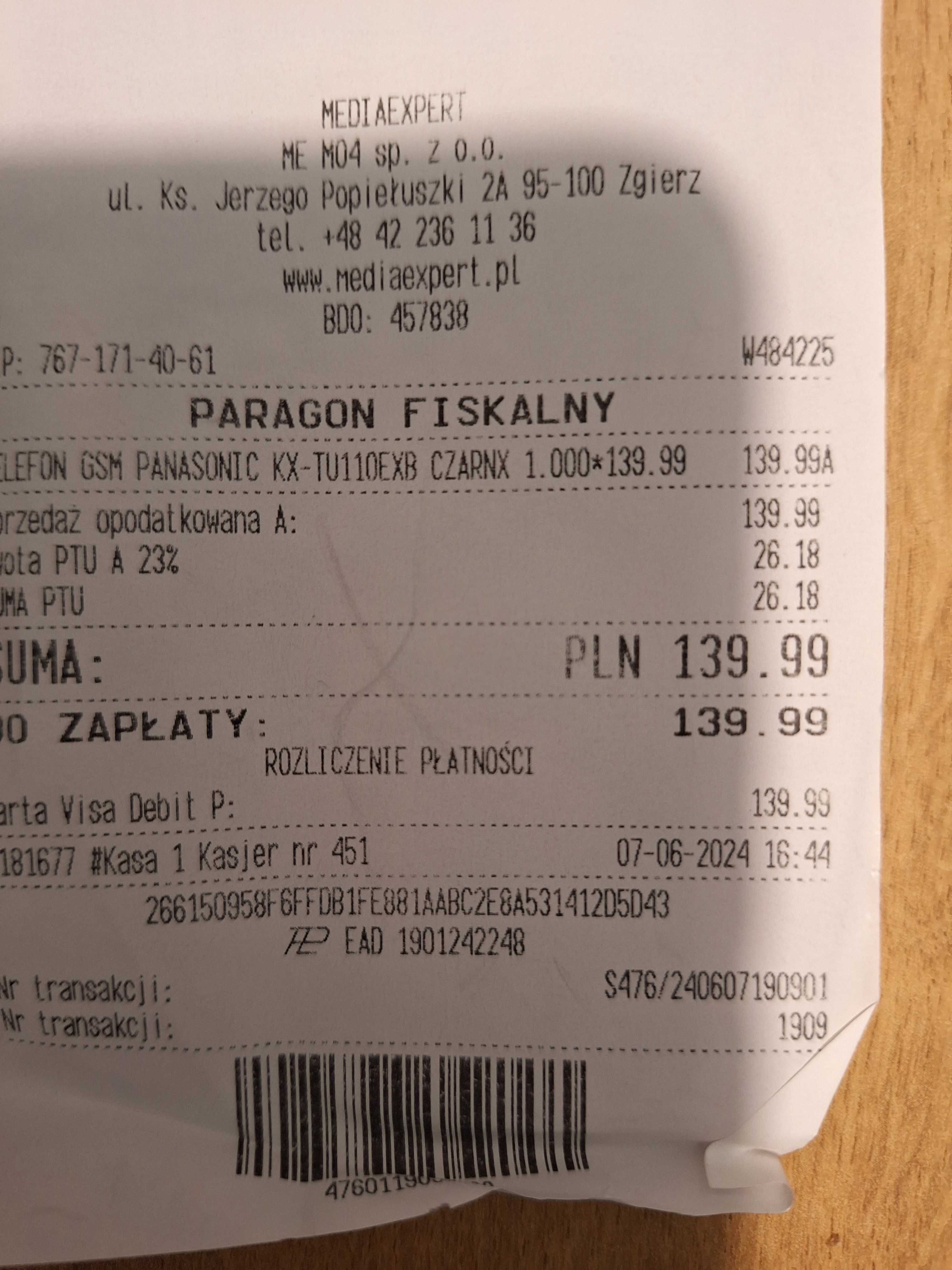 Telefon Panasonic dla seniora z ładowarką i słuchawkami