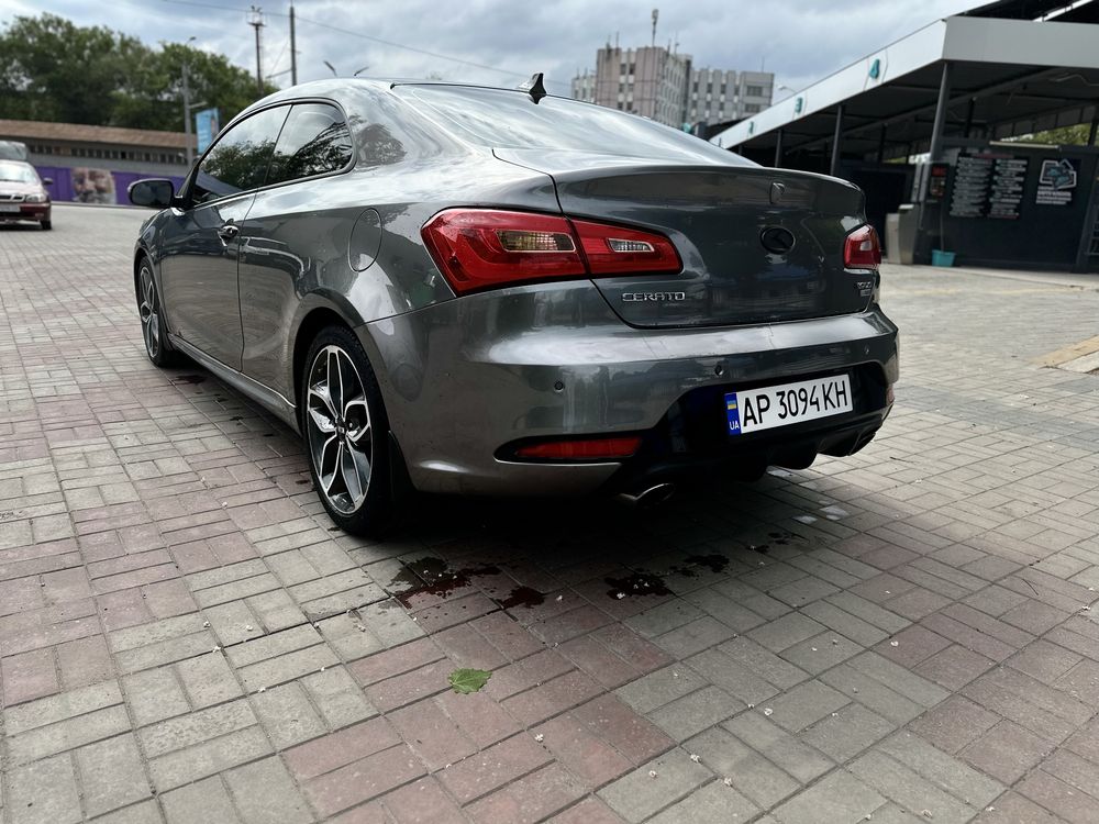 KIA Cerato Koup 1.6 T-GDi ( 204 л.с. ) 2014 год