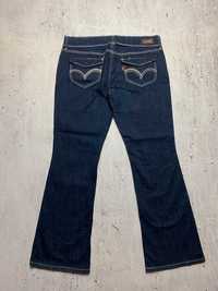 Spodnie jeansowe jeansy Levi Strauss Levi's 524 Too Superlow Dzwony