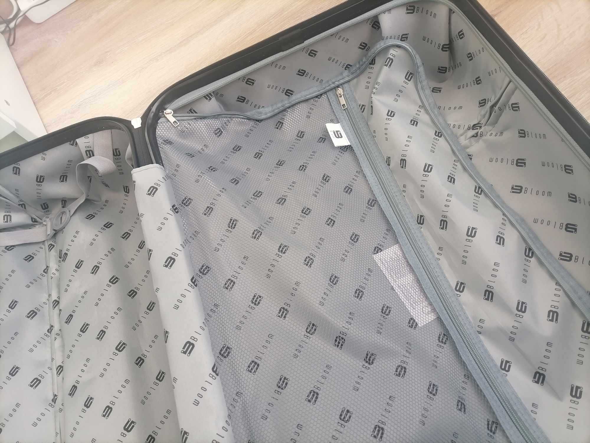 Walizka średnia XL kółka obrotowe nowa samolot