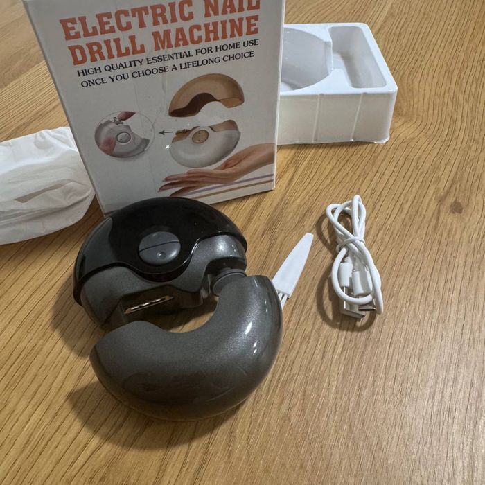 Електрична машинка для догляду за нігтями