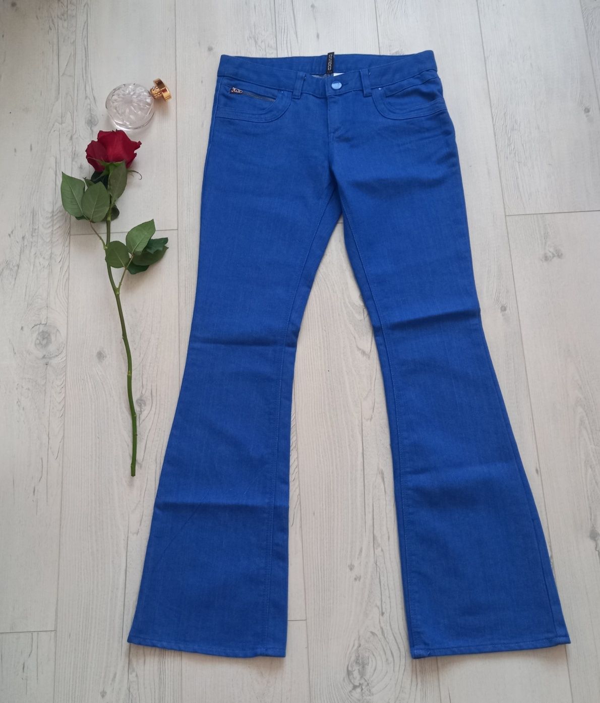 Unikatowe spodnie vintage H&M niebieskie modre jeansy długie dzwony L