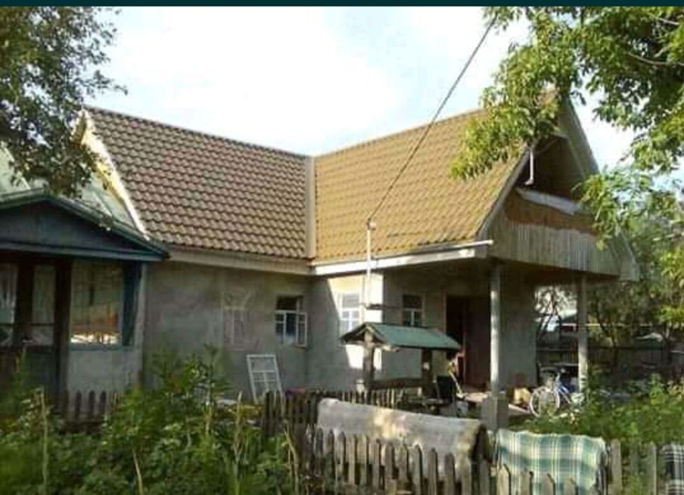 Продам землю с домом на участке