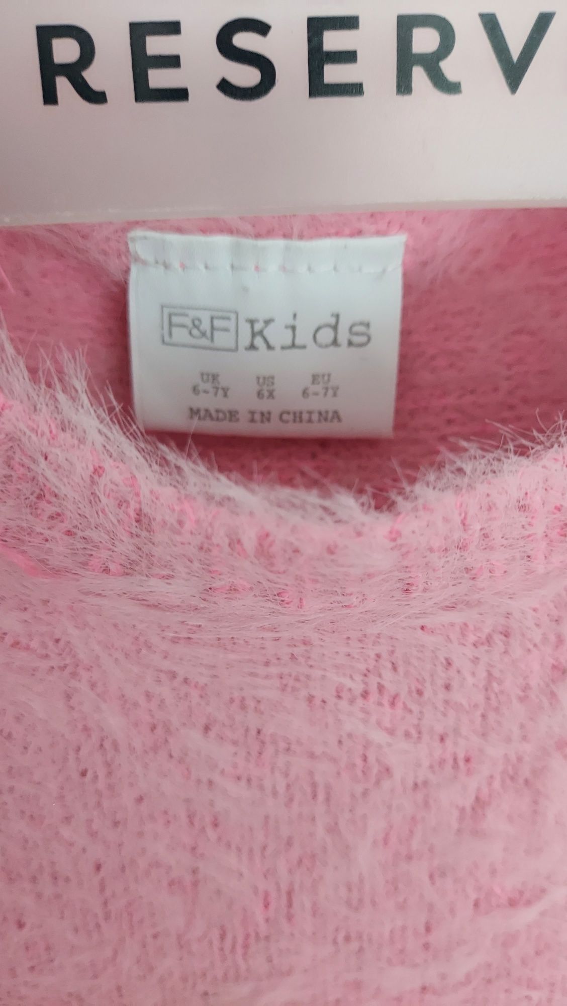 Sweterek różowy r.128