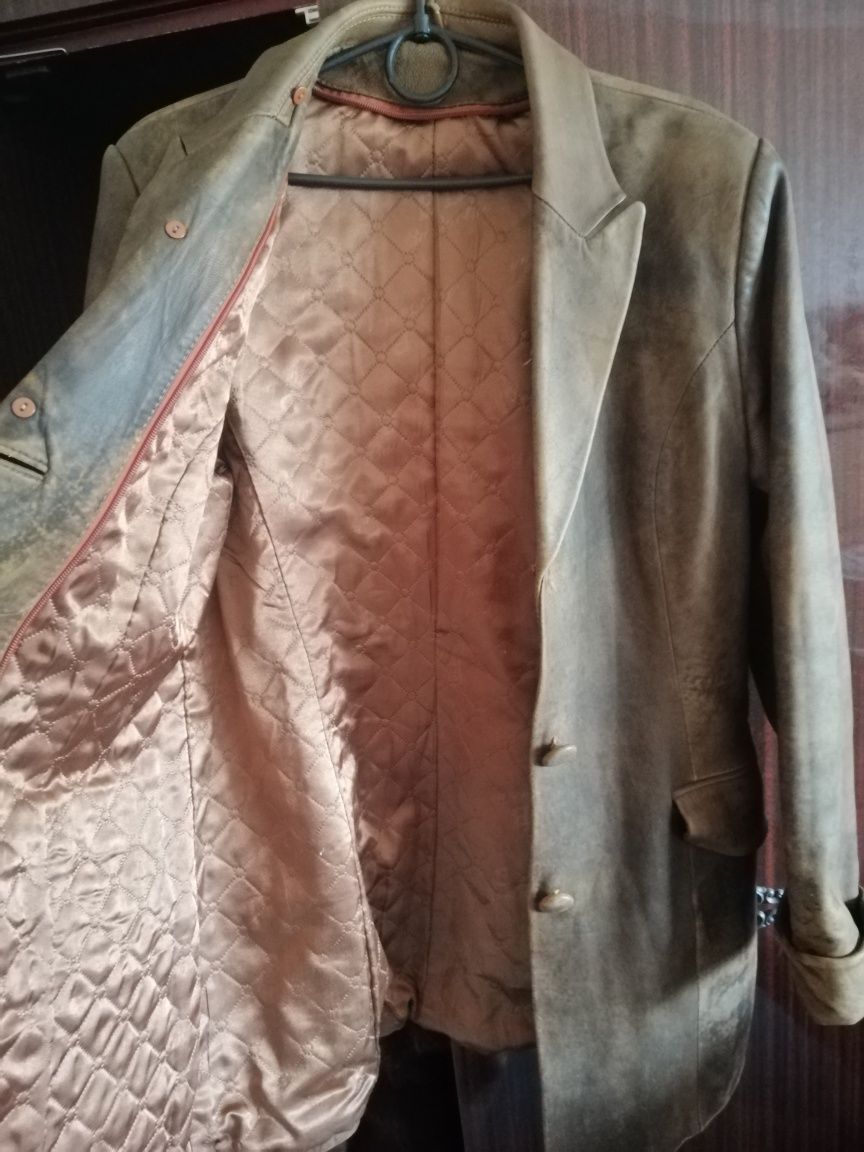 Пальто женское кожаное с мехом