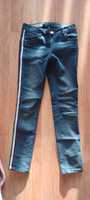 Spodnie ala jeans z lampasami 146