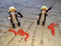 (cena za całość) Playmobil. Podróżnik z wężem.Treser, wąż.