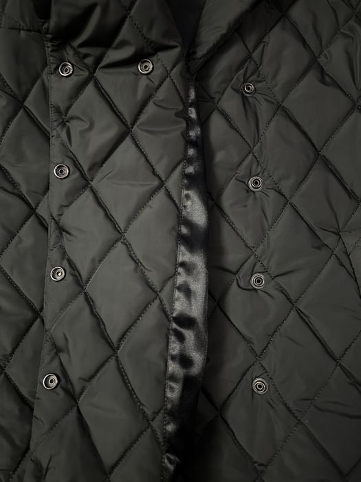 Стильний пуховик під пояс