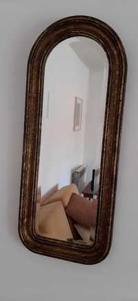 Espelho em madeira maciça com talha dourada