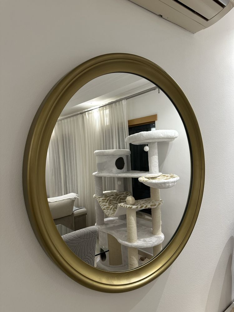 Espelho de parede dourado