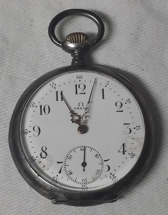 Relógio de bolso antigo Omega em prata 15 rubis