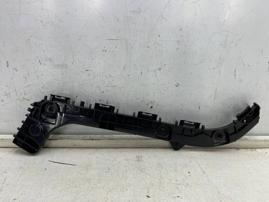 Ślizg Toyota Corolla E21 XII kombi 18r.- NOWE prawe tylne mocowanie zderzaka wspornik uchwyt