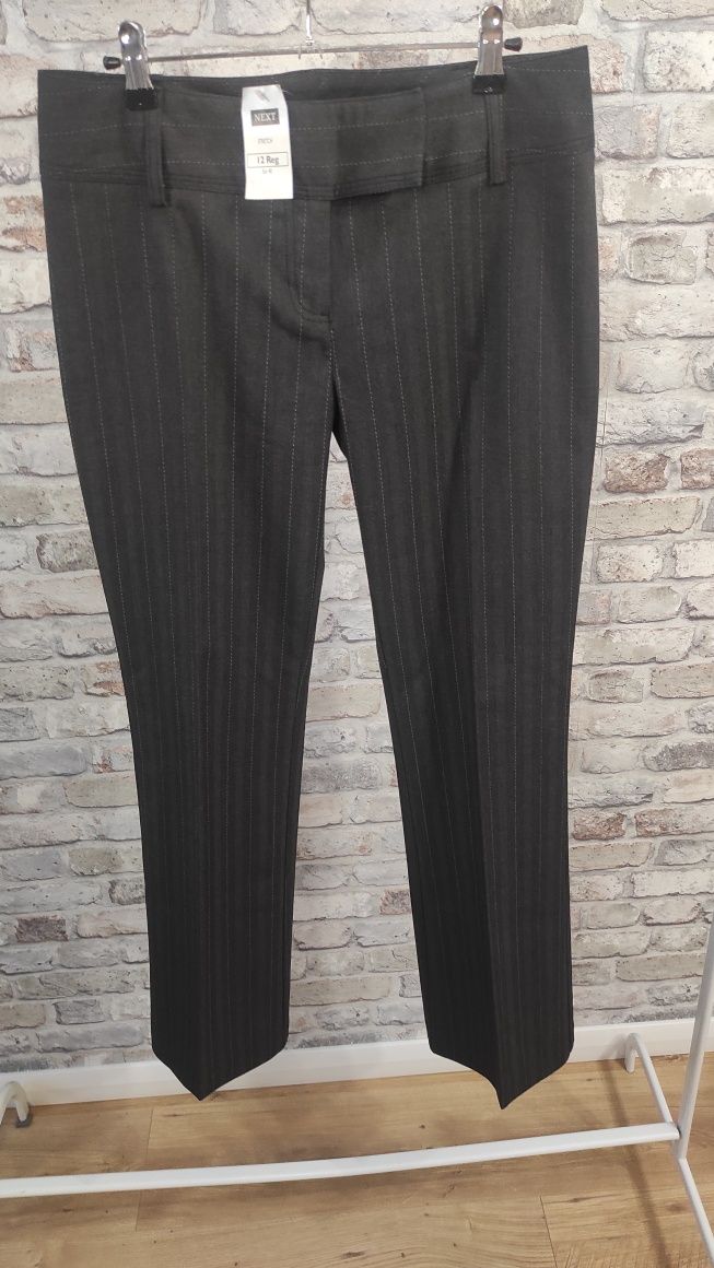 Nowe damskie eleganckie spodnie z kantem i z prostą nogawka