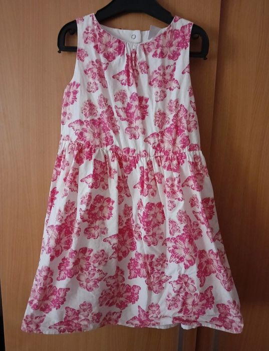 Sukienka w kwiatki dla dziewczynki Pepco, rozmiar 116.