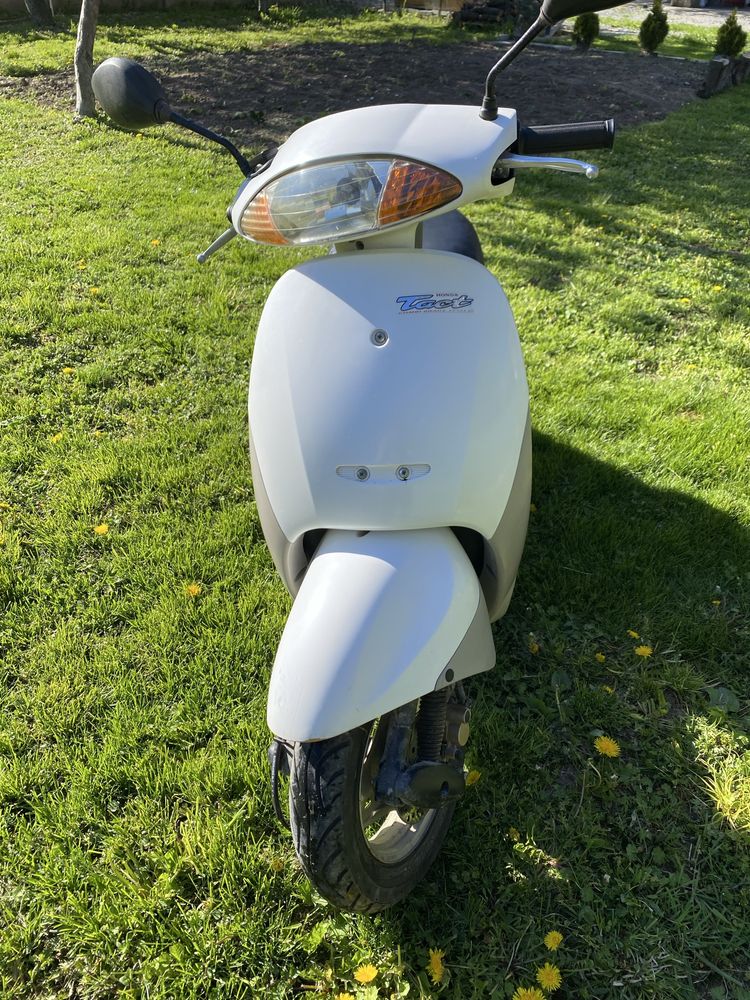 Скутер honda tact