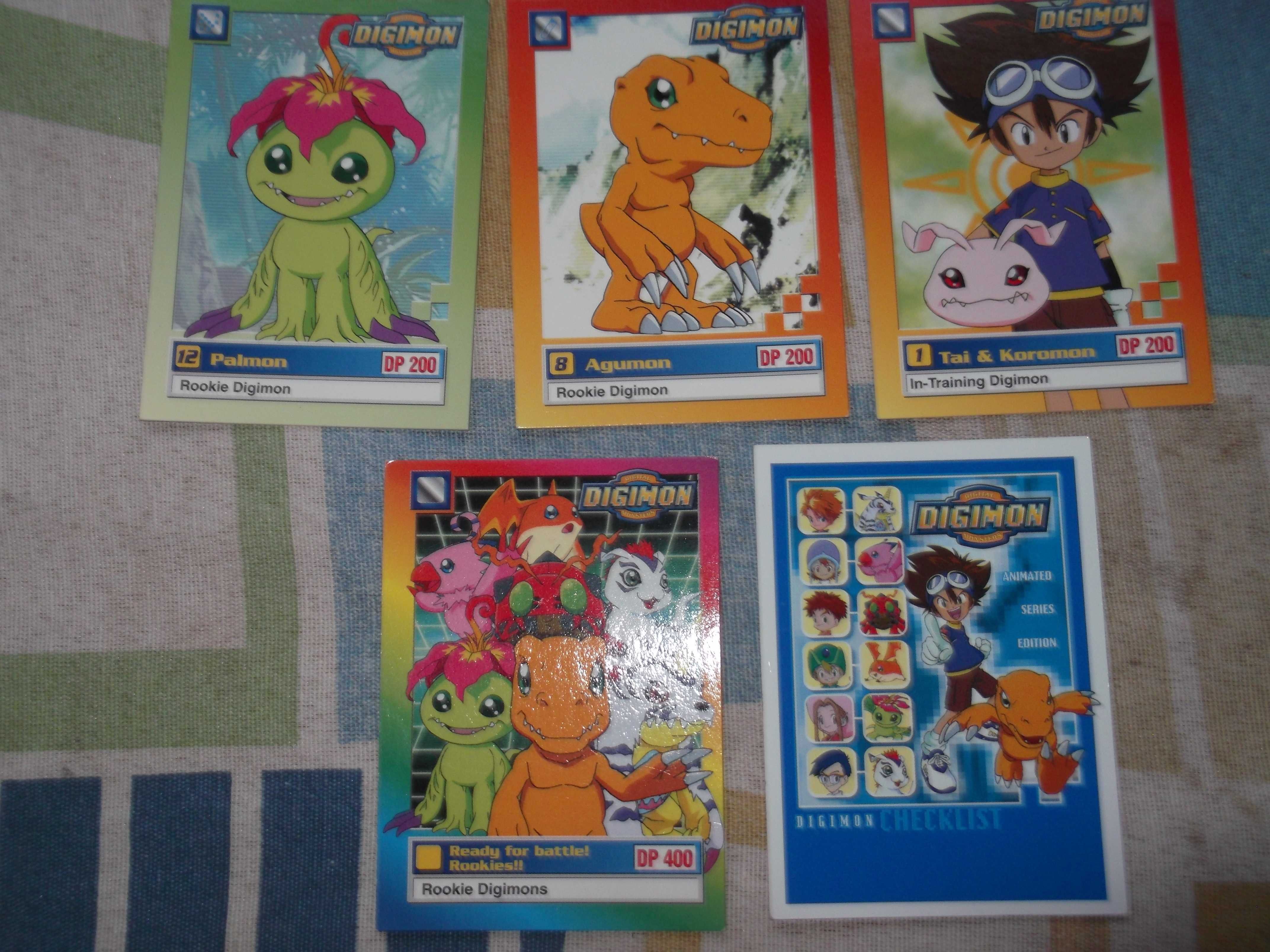 (D) Cartas da Pokémon e Digimon