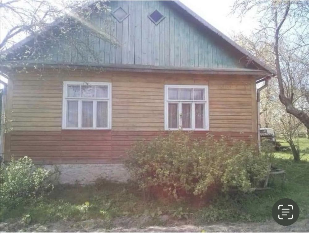 Будинок з приватизованою земельною ділянкою