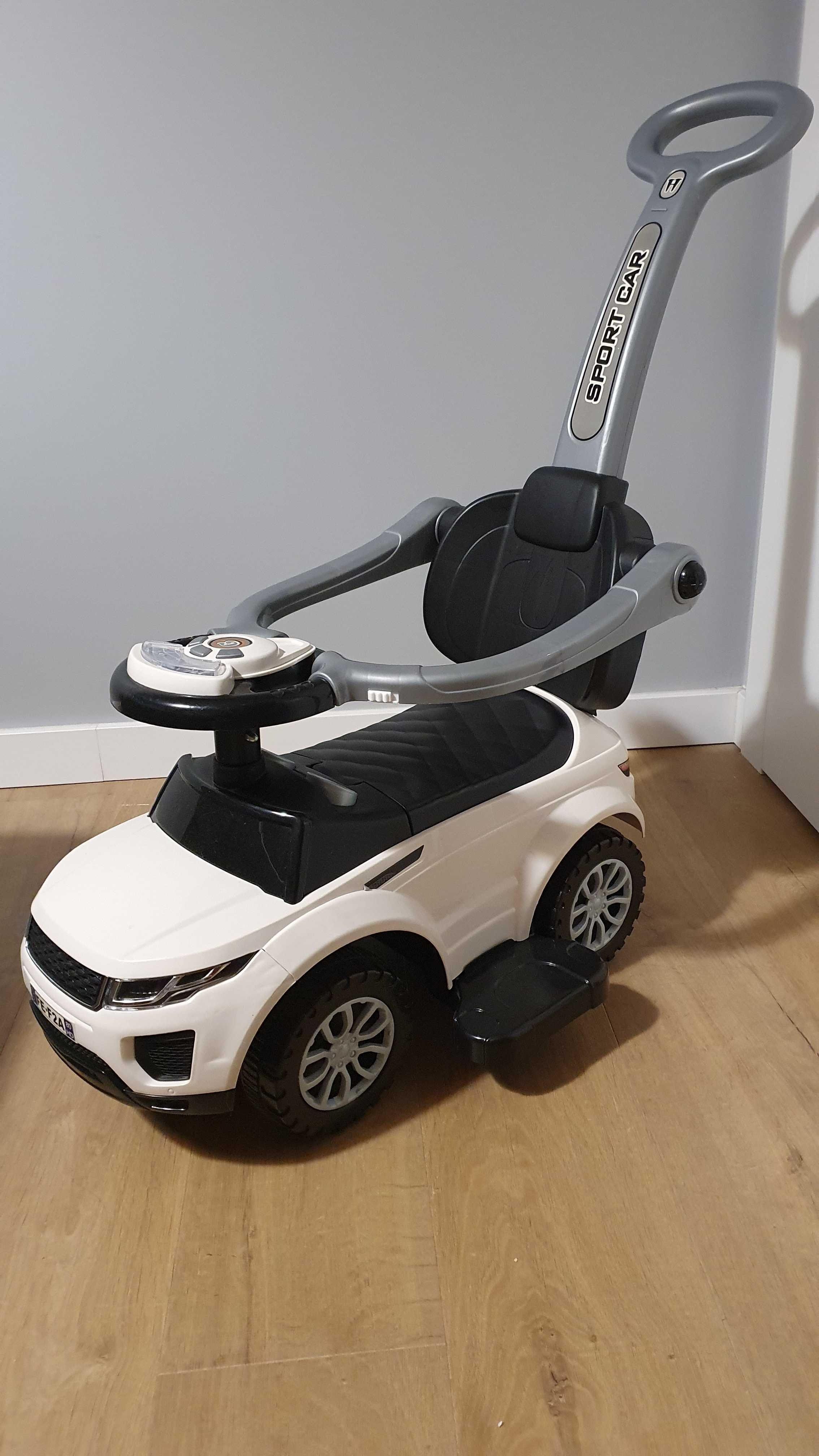 Jeździk Sport Car 614W biały, otwierane siedzisko
