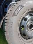 Opony wielosezonowe 185/70R14 z felgami  plus zapasowa