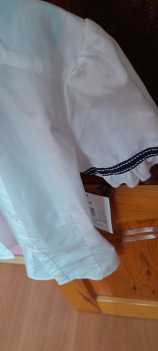 Nowa z metką biała bluzka 134