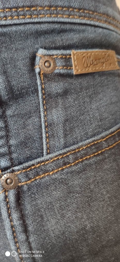 Wrangler Texas Straight Electric Rodeo męskie jeansy rozm 35/34
