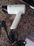 Secador de cabelo da braun.