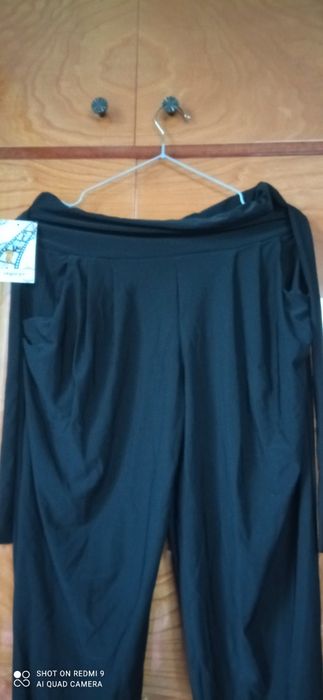 Nowe czarne eleganckie materiałowe spodnie rozm L/ XL